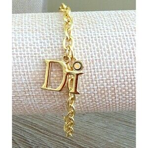 Diamonds International DI Logo Charm Starter Bracelet Gold Tone Tiny Diamond